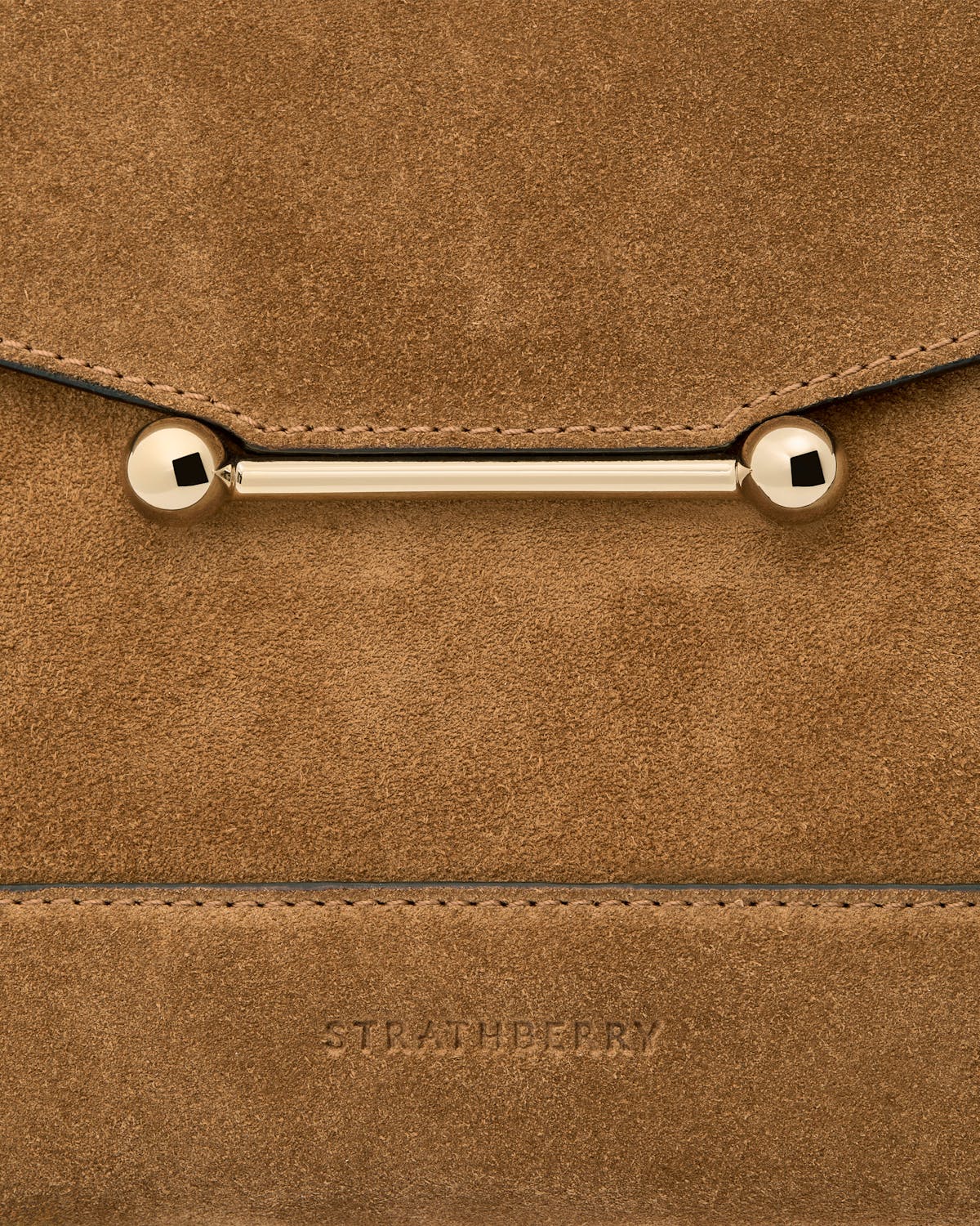 Toffee suede mosaic bag with espresso trim, gold bar hardware and Strathberry embossed logo.