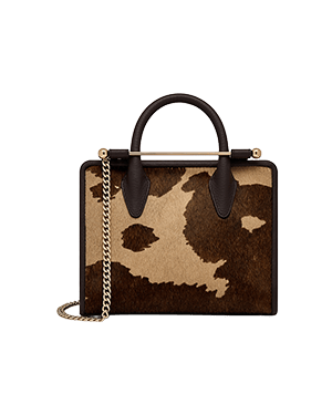 Mini tote in sand and espresso spot print with top handles and gold chain