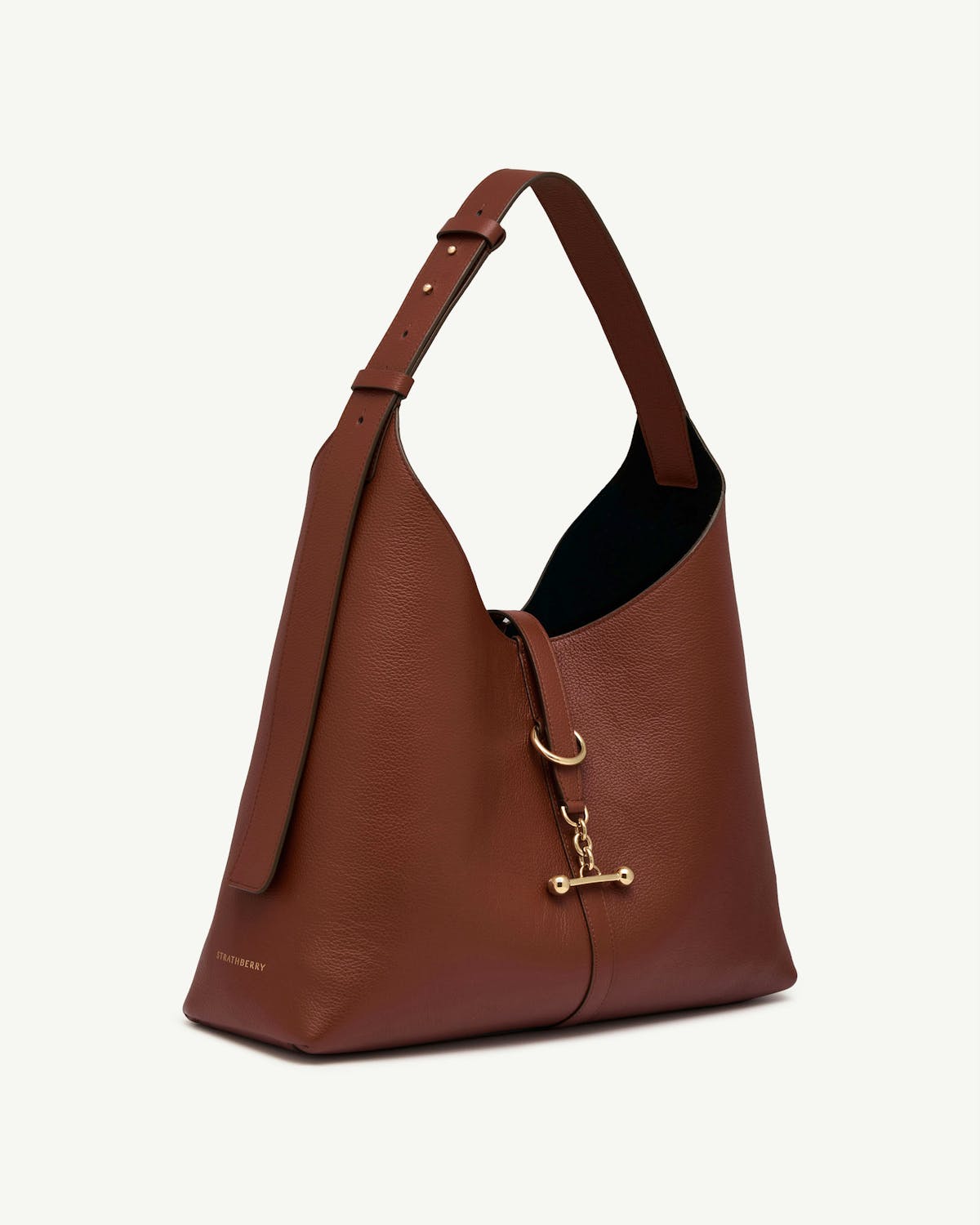 Walnut leather hobo bag with adjustable strap and gold hardware, Strathberry logo.