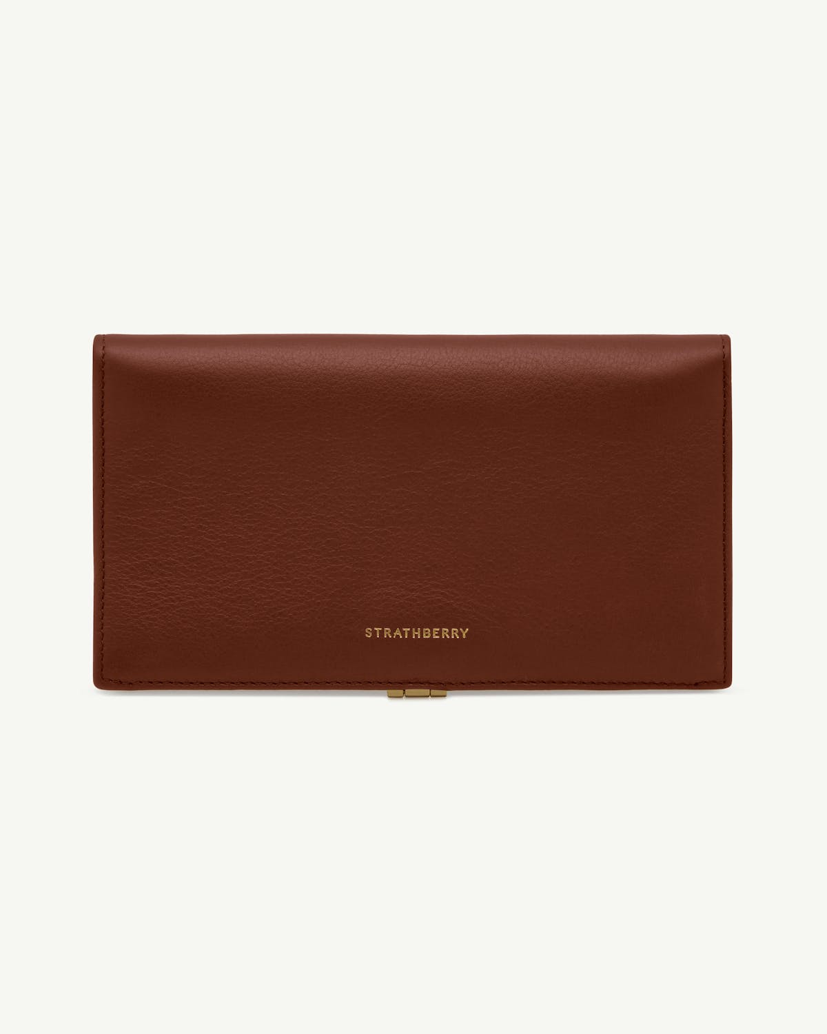 Large Melville Street wallet in walnut leather with fold-over flap and gold Strathberry logo.