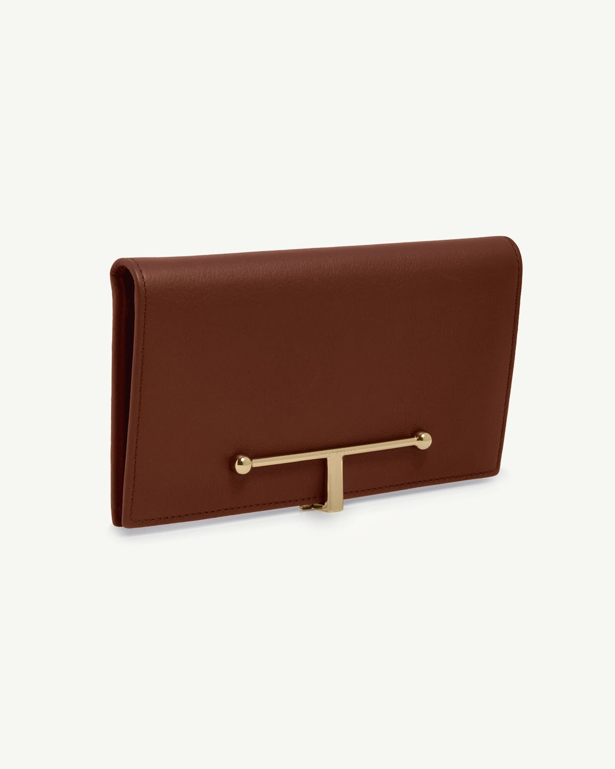 Large walnut leather wallet with gold T-bar fastening on front.