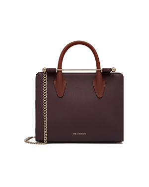 Strathberry mini tote in burgundy with chestnut and walnut trim, gold chain strap.